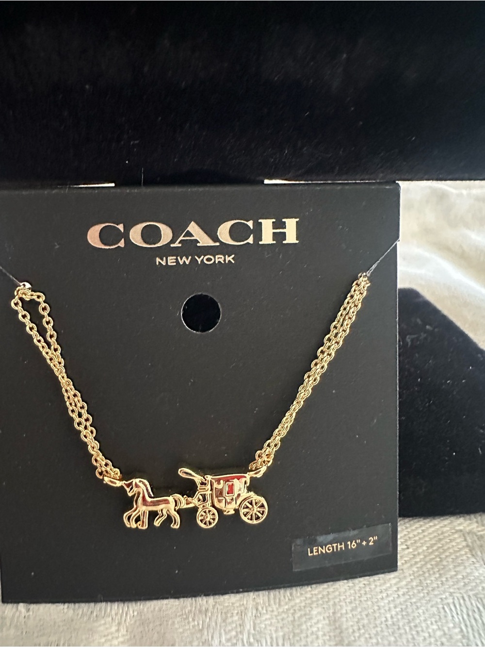 Coach Gold-Tone Horse & Carriage Pendant Necklace